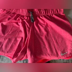 Hot pink Nike shorts
